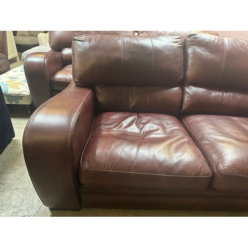 1520 - A cognac leather three seater sofa and two seater sofa