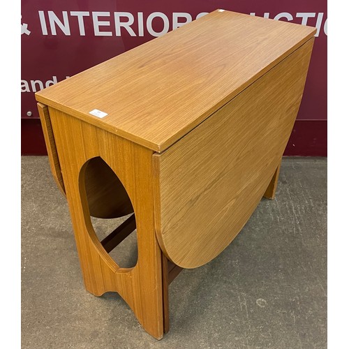 84 - A teak drop leaf table