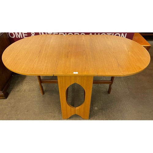 84 - A teak drop leaf table