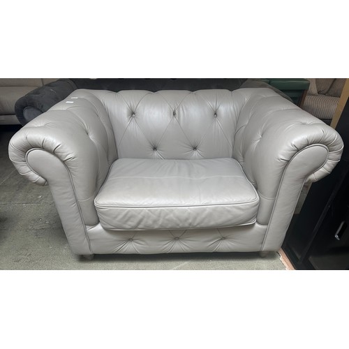 1538 - Stone leather Chesterfield two seater sofa RRP £1379 - damaged, and a grey velvet three seater Chest... 