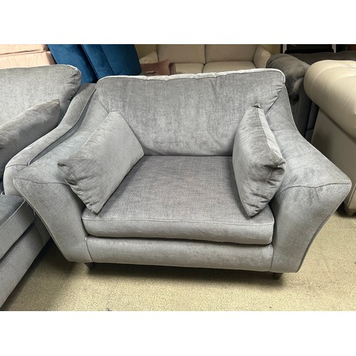 1542 - A pewter upholstered chaise and matching armchair - used