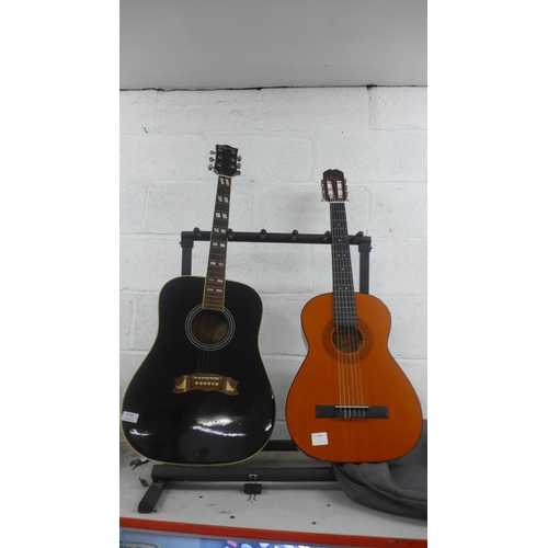 2104 - A Lorenzo 6-string acoustic guitar and an Admira 6-string acoustic guitar with case