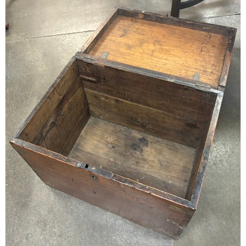 104 - A Victorian teak and brass mounted chest