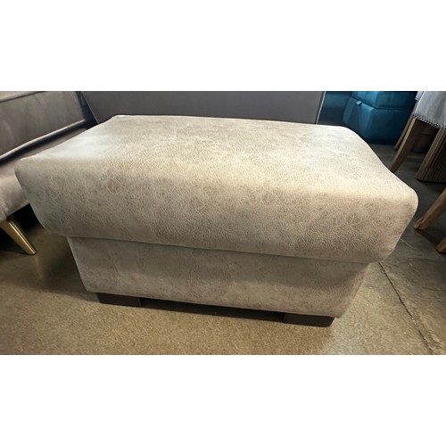 1329 - A stone Alcantara footstool, brand new