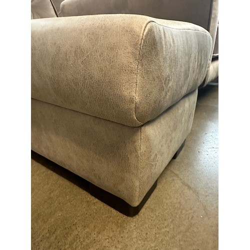 1329 - A stone Alcantara footstool, brand new