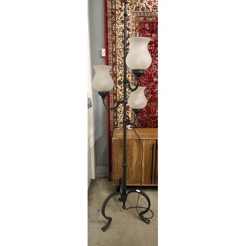 1359 - An industrial style three light floor lamp