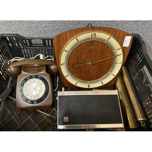 378 - A mid-20th century wall clock, telephone and a Bush radio