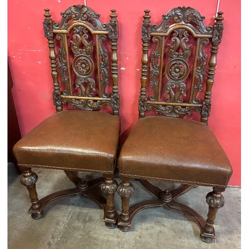 118 - A pair of Victorian Jacobean Revival carved oak side chairs