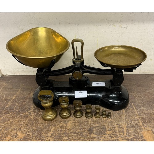 376 - A Libra Scale Co. scales with graduated brass weights