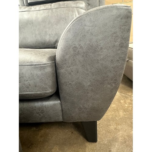 1408 - A charcoal Alcantara L shaped sofa and storage footstool, brand new RRP £1598