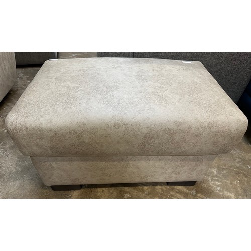 1422 - A stone Alcantara footstool, brand new