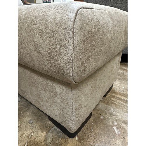 1422 - A stone Alcantara footstool, brand new