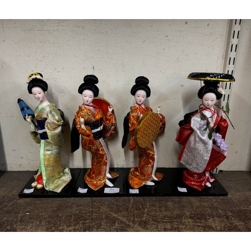 361 - Four Japanese figures of Geisha girls