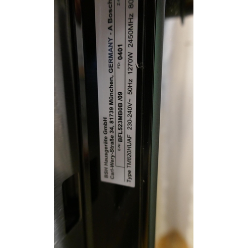 4107 - Bosch Serie 4 Wall Microwave ( Broken Door) - model no -BFL523MB0B (554-91)   * This lot is subject ... 