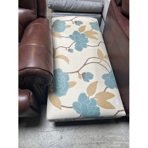 1521A - A floral upholstered footstool