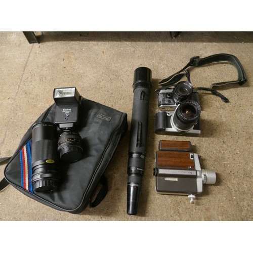 2372 - A quantity of photography equipment including a Canon EOS 500N camera, a Yashica FX-D quartz camera,... 