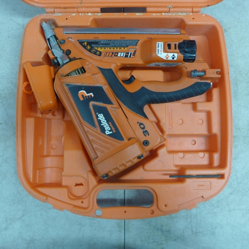 2004 - A Paslode Impulse Frame Master-Li 30 degree framing nailer in case