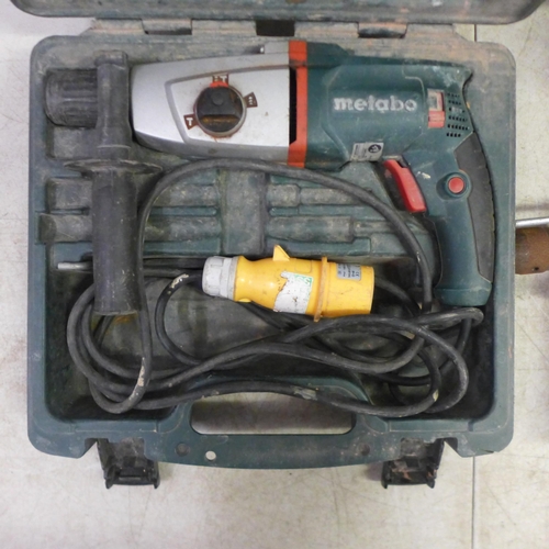 2009 - A quantity of power tools including a Metabo KHE-2443, 110V hammer drill, a Makita 5621RD power saw,... 