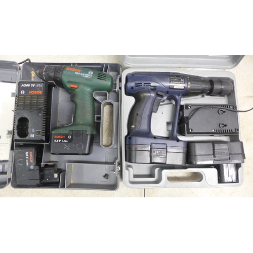 2026 - A Bosch PSR9-6VE5-2 drill with 2 batteries and charger and a Ferm FCD2400I drill with 2 batteries an... 