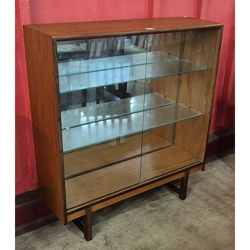 4 - A teak display cabinet