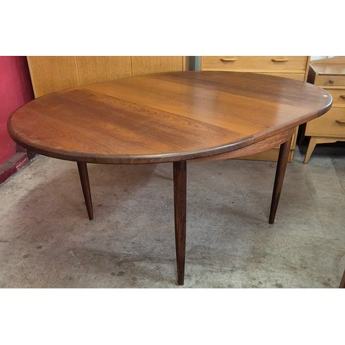 7A - A G-Plan Fresco teak circular extending dining table