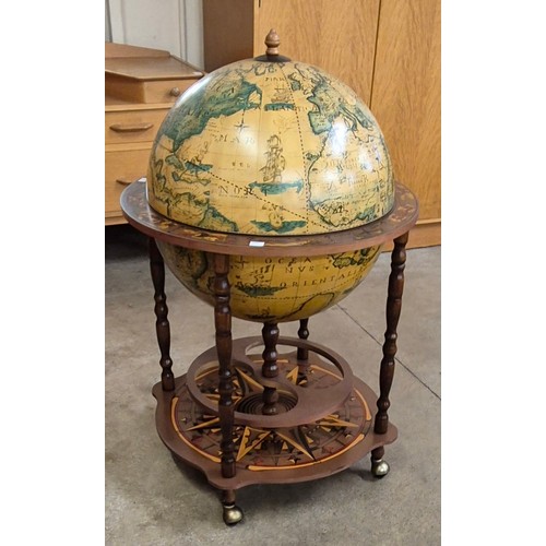 11 - An Italian terrestrial globe cocktail cabinet/trolley