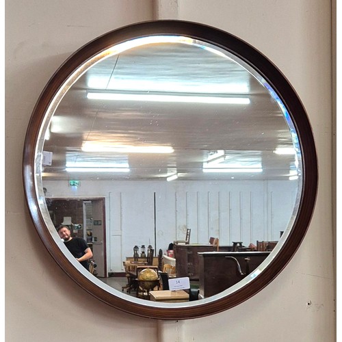 14 - A teak circular framed mirror