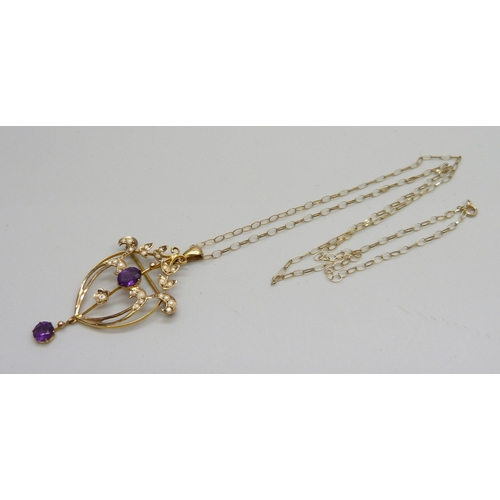 1007 - A 9ct gold Art Nouveau amethyst and seed pearl pendant on a 9ct gold chain, 3.9g, lacking one seed p... 