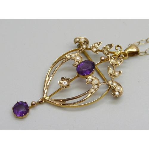 1007 - A 9ct gold Art Nouveau amethyst and seed pearl pendant on a 9ct gold chain, 3.9g, lacking one seed p... 