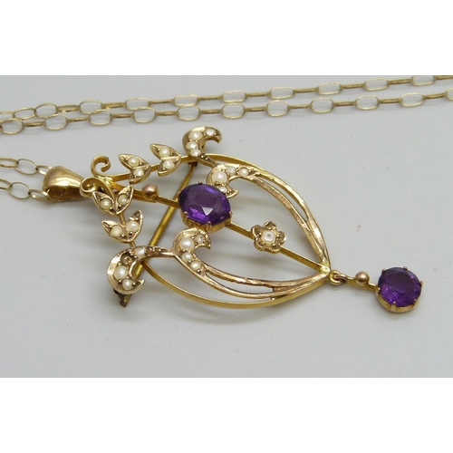 1007 - A 9ct gold Art Nouveau amethyst and seed pearl pendant on a 9ct gold chain, 3.9g, lacking one seed p... 