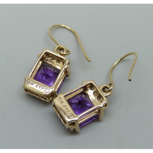 1009 - A pair of 10kt gold, amethyst and diamond earrings, 2.5g