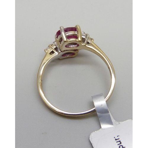 1015 - A silver gilt ruby and topaz ring, S