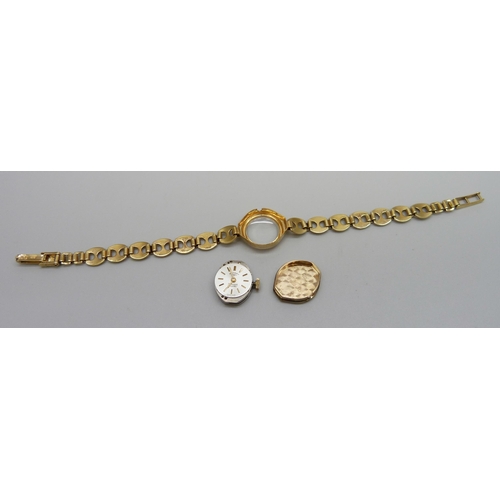 1023 - A lady's 9ct gold Rotary wristwatch on a 9ct gold Mariner link strap, 8.7g of gold