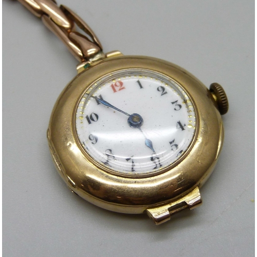 1024 - Two lady's 9ct gold cased wristwatches, one Omega with enamel dial, movement numbered 7603296, the o... 