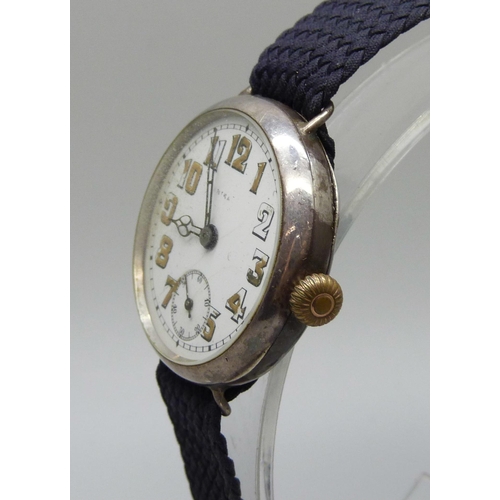 1025 - A silver cased Rolex WWI pilot/military officers trench wristwatch, London import mark for 1915, inn... 