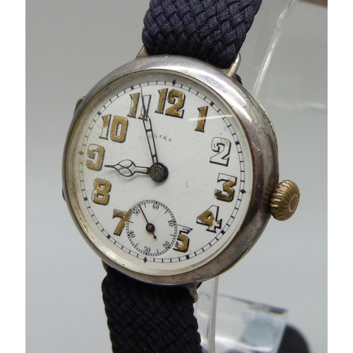 1025 - A silver cased Rolex WWI pilot/military officers trench wristwatch, London import mark for 1915, inn... 