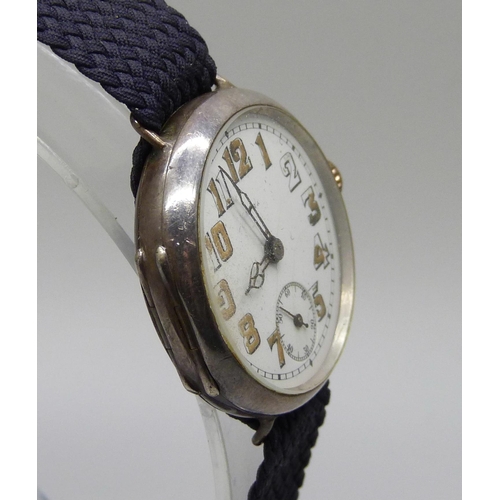 1025 - A silver cased Rolex WWI pilot/military officers trench wristwatch, London import mark for 1915, inn... 