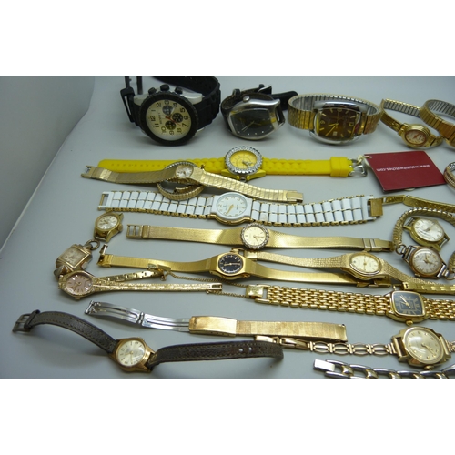 1031 - A collection of lady's and gentleman's wristwatches