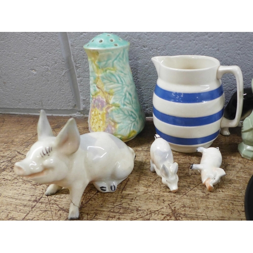 1041 - A Shelley dripware vase, a Poole matchbox holder, Beswick pigs, a/f, a large Portmeirion cup and sau... 