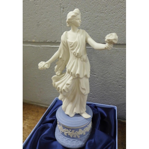 1054 - A Wedgwood figure, The Dancing Hours Collection Floral Posy, 1645/3000, boxed with certificate, a We... 