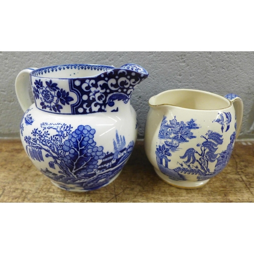 1065 - Two graduated sets of three blue and white jugs, Sadler and Green & Co **PLEASE NOTE THIS LOT IS NOT... 