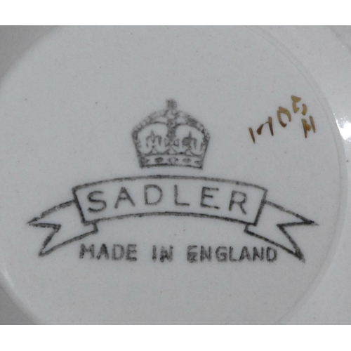 1065 - Two graduated sets of three blue and white jugs, Sadler and Green & Co **PLEASE NOTE THIS LOT IS NOT... 