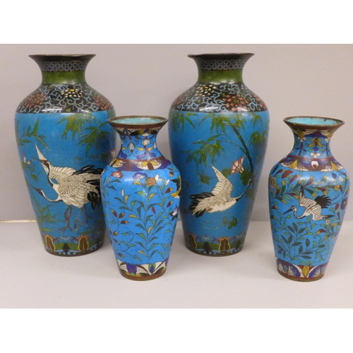 609 - Two pairs of cloisonné vases decorated with herons, other birds, flowers and foliage, tallest 21cm, ... 