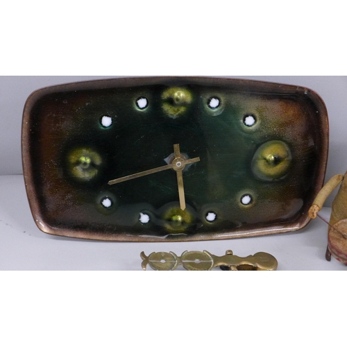 622 - A Schuco clockwork toy, a brass sovereign balance, an enamelled clock and a Southwell, Nottinghamshi... 