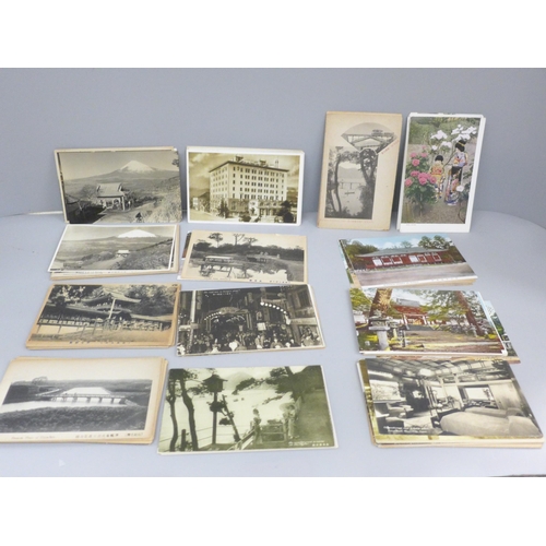 627 - Approximately 100 vintage Japanese postcards