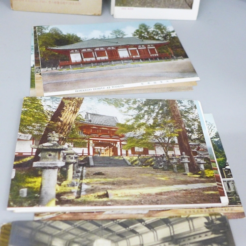 627 - Approximately 100 vintage Japanese postcards