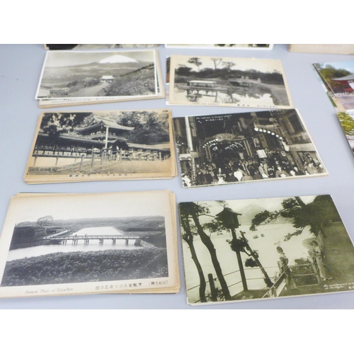 627 - Approximately 100 vintage Japanese postcards