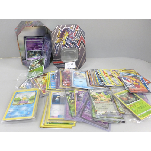 643 - A collection of Pokemon cards including V, holographic, Japanese cards, etc.