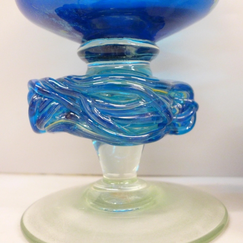 648 - A Mdina glass paperweight and a Mdina goblet shaped vase, 19cm