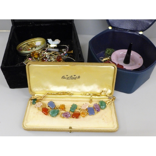 654 - Costume jewellery, including an Art Deco Bakelite buckle bangle, semi-precious stone set necklace, e... 